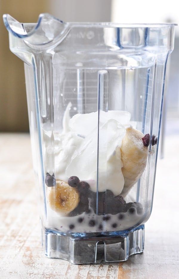 Banana Blueberry Smoothie ingredients in a blender