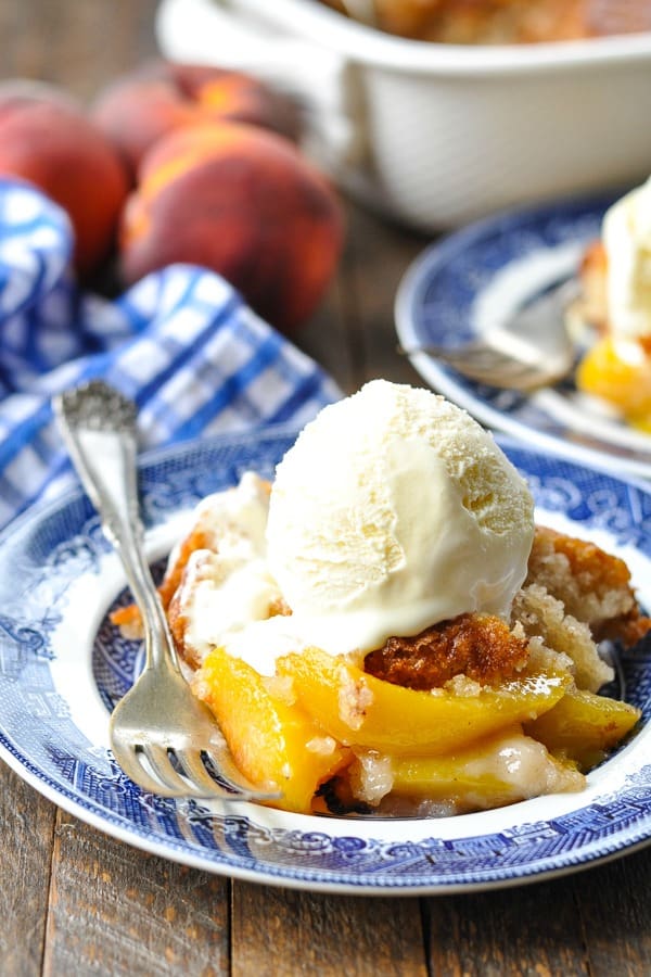 Close up front shot of a plate of bisquick peach cobbler