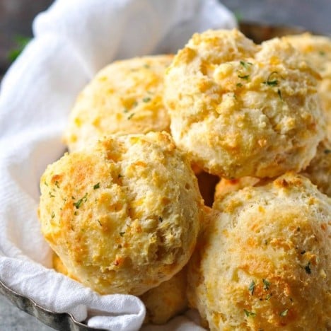 Close up side shot of a bowl of homemade Cheddar Bay Biscuits just like at Red Lobster