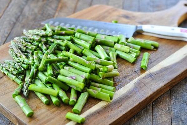 Chopped asparagus on a cutting board