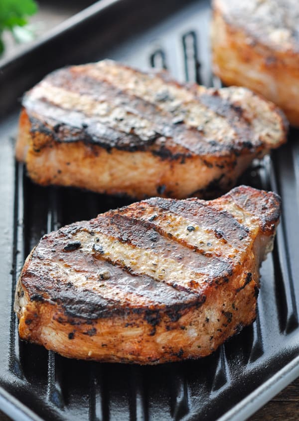 Close up front shot of juicy and tender grilled pork chops