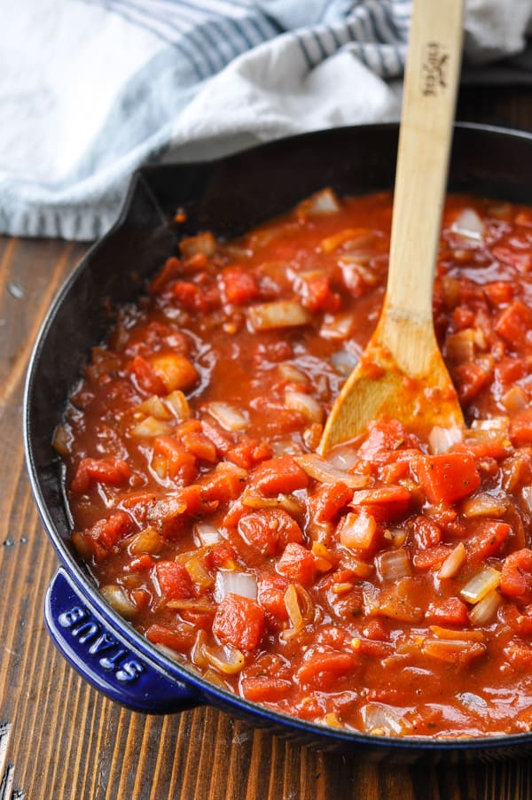 Homemade tomato sauce for pasta in a cast iron skillet
