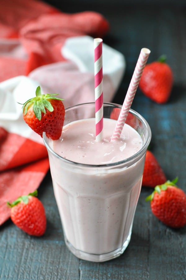 Shot from above of a healthy strawberry banana smoothie with yogurt