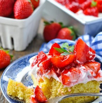 Close up front shot of a piece of Strawberry Shortcake Cake on a serving plate