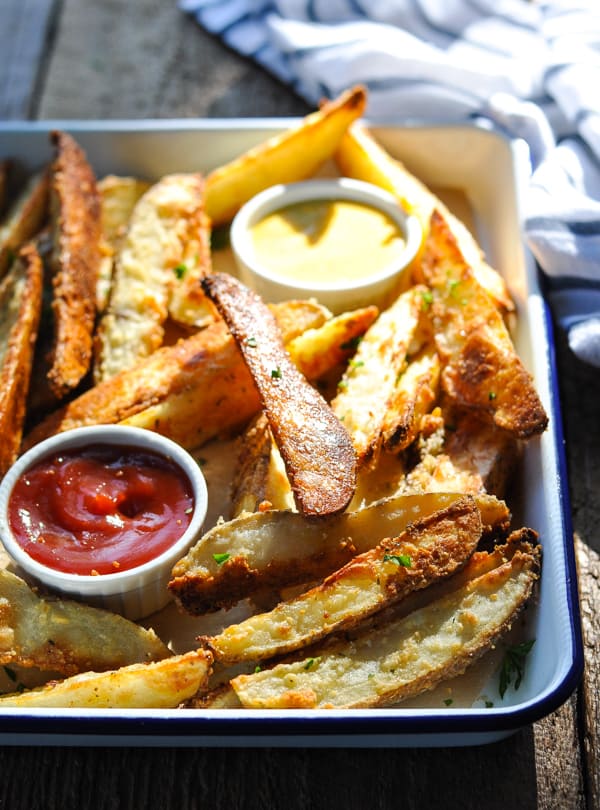 Front shot of a tray of Baked Potato Wedges
