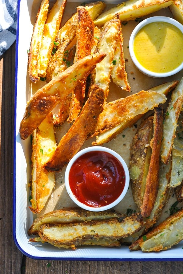 Close overhead shot of a tray of baked potato wedges