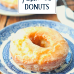 Homemade sour cream donut on a plate with text title overlay
