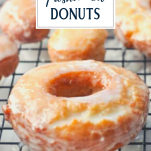 Old fashioned doughnuts on a cooling rack with text title overlay