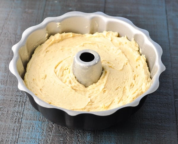 Sour cream pound cake batter in a Bundt pan