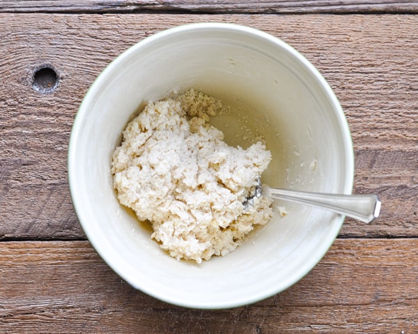 Biscuit dough for cobbler in a small mixing bowl