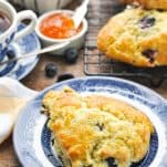 Blueberry scone on a blue and white plate