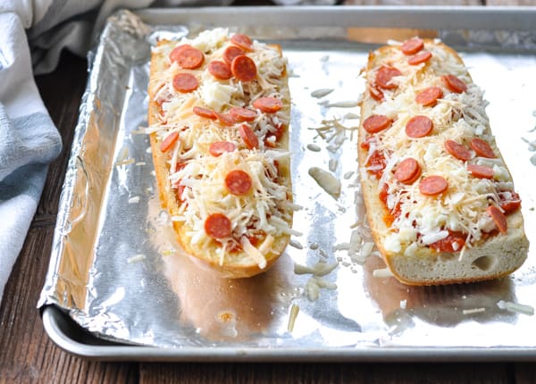 French bread pizza on baking sheet before baking