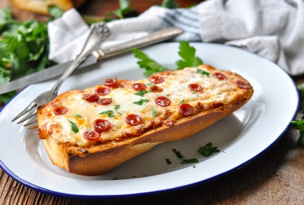 Horizontal shot of French Bread Pizza on a plate