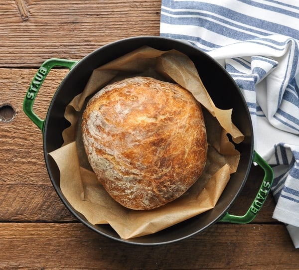 Overhead shot of a no knead bread loaf in a Dutch oven