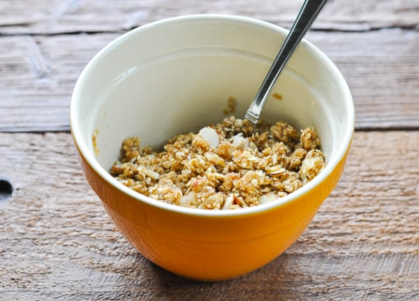 Oat streusel topping for peach crisp in a small mixing bowl