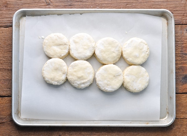Shortcake biscuit dough on a parchment lined baking sheet