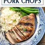 Overhead shot of a plate of grilled pork chops with text title box at top