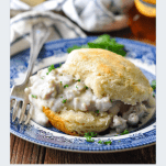 Front image of biscuits and sausage gravy with the title in text below the photo