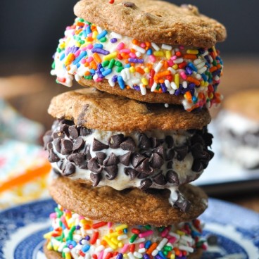Close up shot of 3 cookie ice cream sandwiches stacked on top of each other