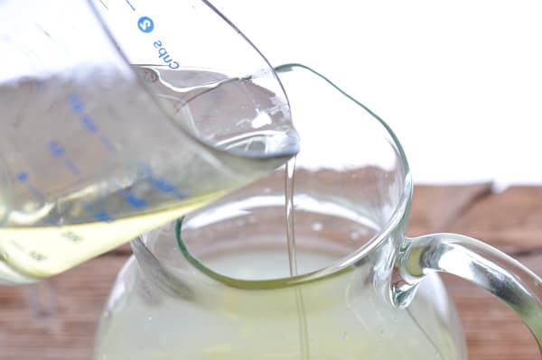 Mixing a pitcher of lemonade