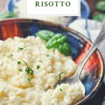 Side shot of a bowl of Parmesan Risotto with a text title at the top of the image