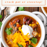 Overhead shot of a bowl of 9 can taco soup with ground beef and a text title box at the top