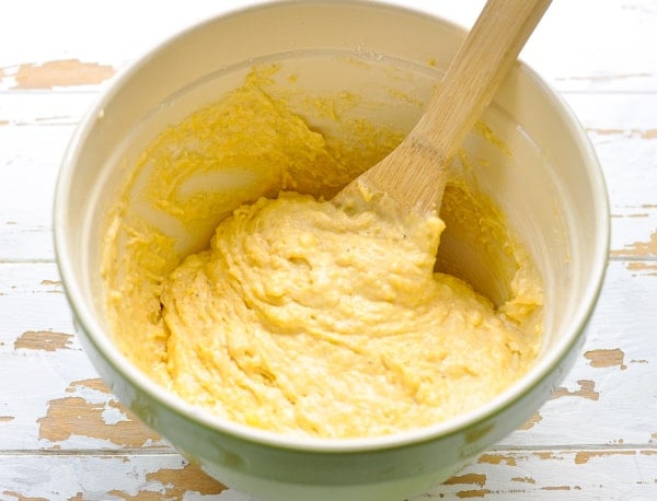 Corn muffin batter in a large mixing bowl
