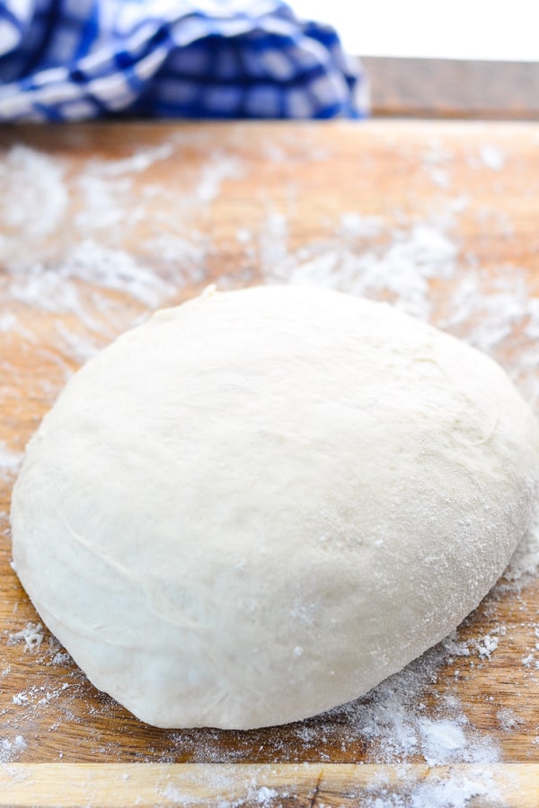 Front shot of a round ball of easy pizza dough