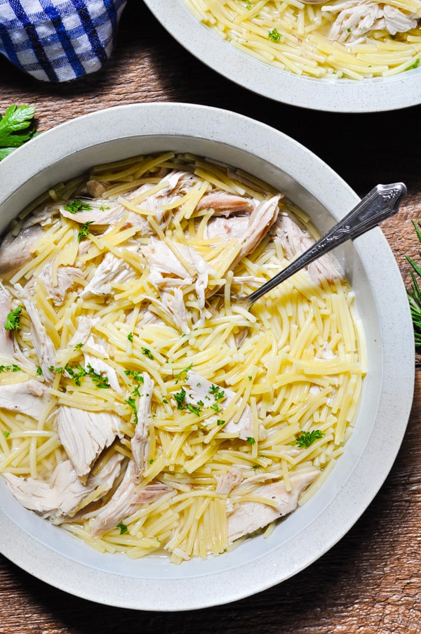 Close overhead image of a big bowl of homemade chicken and noodles