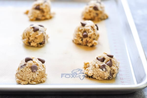 Oatmeal chocolate chip cookie dough on a baking sheet