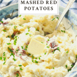 Close up shot of a bowl of mashed red potatoes with text title at top