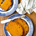 Overhead image of two plates of the best pumpkin bread recipe