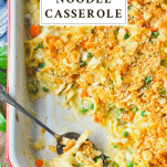 Overhead image of a baking dish full of chicken noodle casserole from scratch with a text title box at the top