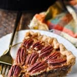 Close up shot of a piece of easy pecan pie