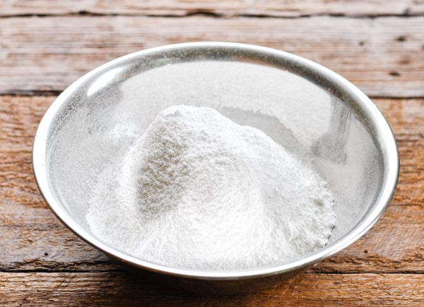 Bowl of sifted powdered sugar