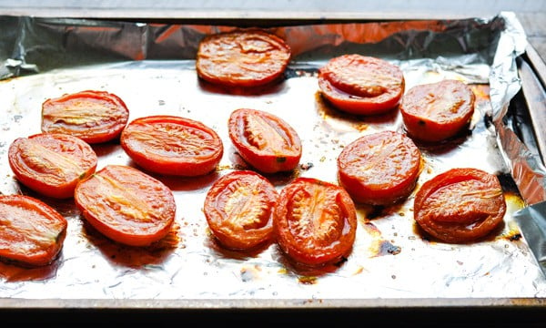 Roasted tomatoes on a baking sheet