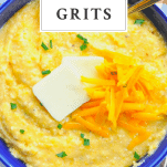 Close overhead shot of a bowl of cheddar cheese grits with a text title box at the top
