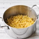 Pot of cooked egg noodles