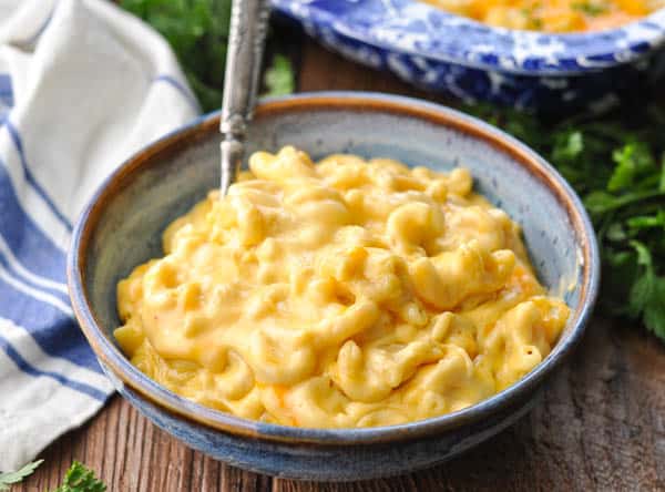 Horizontal shot of a bowl full of creamy macaroni and cheese