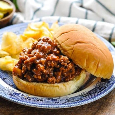 Square side shot of homemade sloppy joes on a plate.