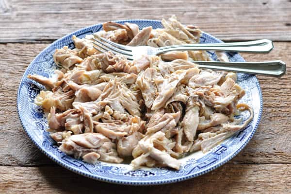 Shredded chicken thighs on a plate