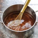 Boiling chocolate mixture for Texas Sheet Cake