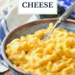 Bowl of creamy baked mac and cheese recipe with text title overlay