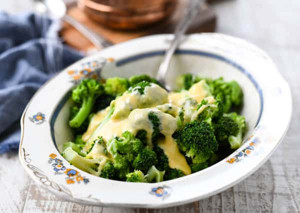 Horizontal shot of a bowl of broccoli and cheese