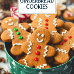 Close up shot of gingerbread man cookies with text title overlay