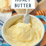 Close up side shot of a bowl of homemade whipped honey butter with text title box at the top