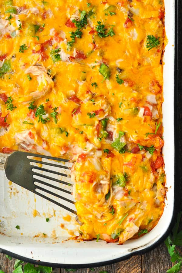 Close overhead image of a casserole dish full of the best king ranch chicken casserole recipe