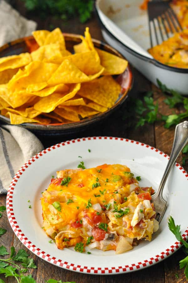 Fork on a plate of the best king ranch chicken recipe