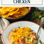 Side shot of easy King Ranch Chicken served on a plate with text title box at top