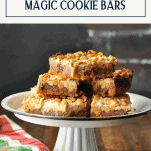 Platter of 7 layer magic cookie bars with a text title box at the top